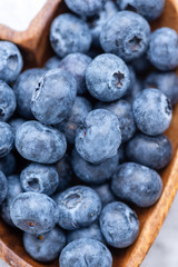 blueberry close up macro in wooden bowl