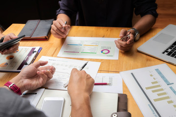 Business team meeting and discussing project plan. Businessmen discussing together in meeting room. Professional investor working with business project together. Finance managers task.