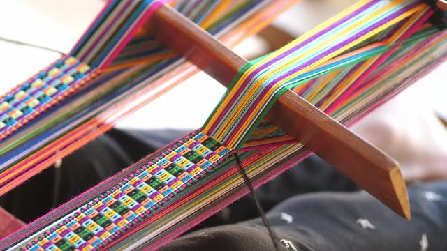 Indigenous people weaving native cloths , culture of thailand.
