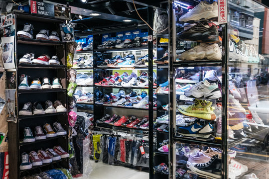 Collection of sneakers in urban sports wear retail shop at sneaker street in Hongkong - November, 2019