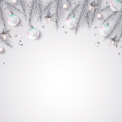 Christmas background with fir branches and dwcorations in elegant white and silver color