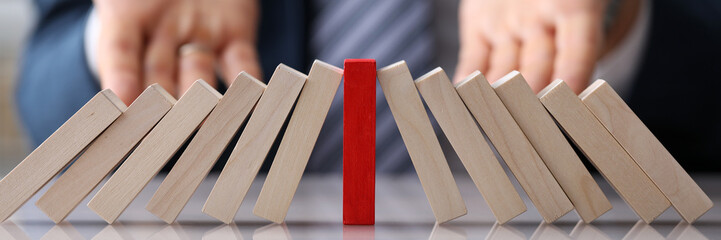 Businessman throwing up hands