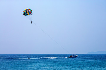 Parasailing water sports in Pattaya, Thailand.