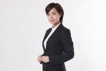 Young Asian short hair female model in formal dress which is good for business purpose