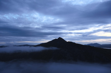 Fototapeta na wymiar Lonely mountain at dawn.