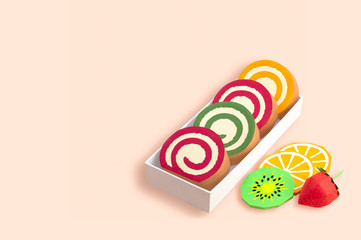 Paper roll cake with fruit marmalade