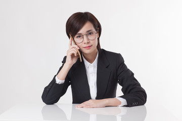 Young Asian short hair female model in formal dress which is good for business purpose