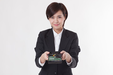 Young Asian short hair female model in formal dress which is good for business purpose