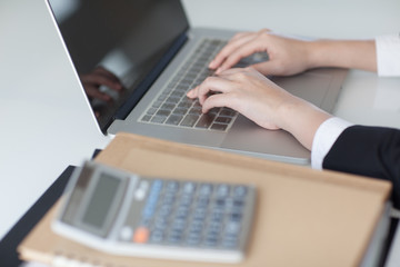 beautiful hands on a laptop keyboard