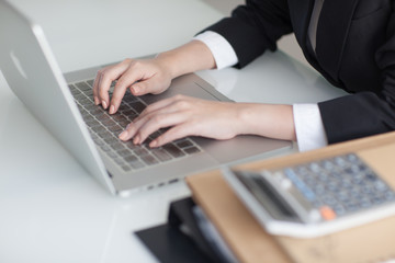 beautiful hands on a laptop keyboard