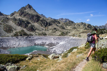 Naklejka na ściany i meble On a path above Lake Campana in the Pyrenees