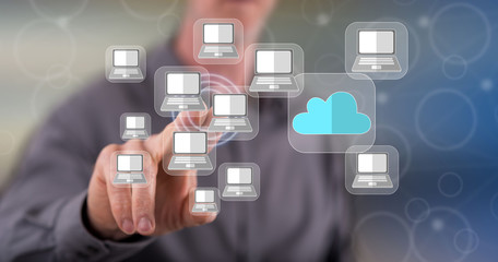 Man touching a cloud computing concept