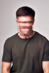 Concept Shot Of Man With Distorted Face Illustrating Mental Health Issues