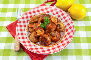 meatballs with tomato sauce on a plate
