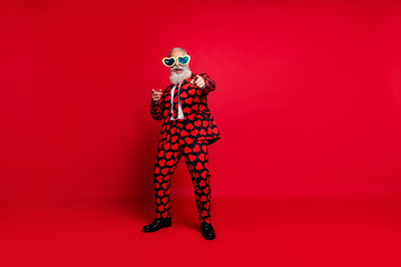 Full length body size view of his he nice attractive cool crazy cheerful cheery glad white-haired guy dancing having fun take pick you isolated on bright vivid shine vibrant red color background