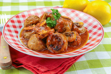 meatballs with tomato sauce on a plate