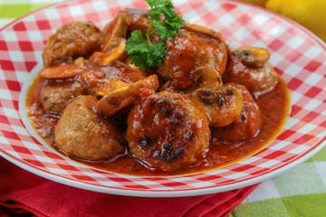 meatballs with tomato sauce on a plate