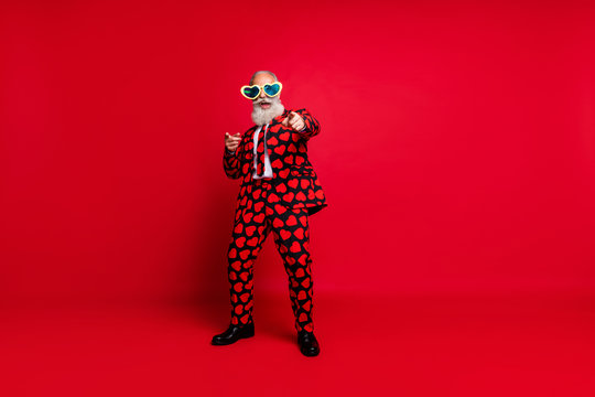 Full length body size view of his he nice attractive cool crazy cheerful cheery glad white-haired guy dancing having fun take pick you isolated on bright vivid shine vibrant red color background