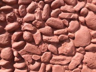 Decorative red small stone background.