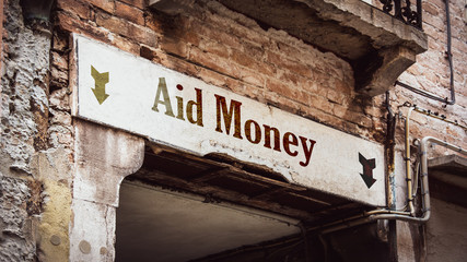 Obraz premium Street Sign to Aid Money
