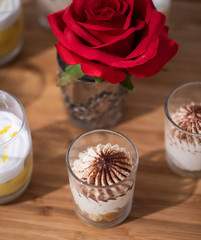 cup of cake and flowers