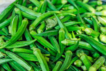 Fresh green okra in vegetable market 