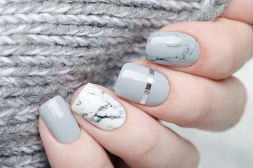 Acrylic prints Nail studio white grey marble manicure with silver stripe on grey background