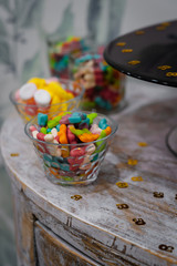 table with gummy bowls, birthday decoration, confetti, 50th birthday