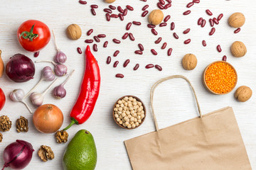 A set of products for diet food. Brown paper bag with vegetables. .
