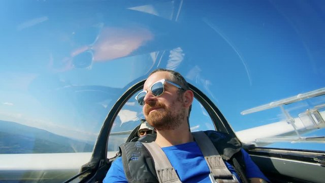 Pilot or passenger in cockpit of private plane