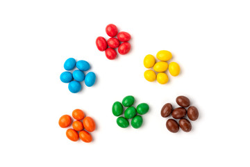 Color dragee isolated on white background.