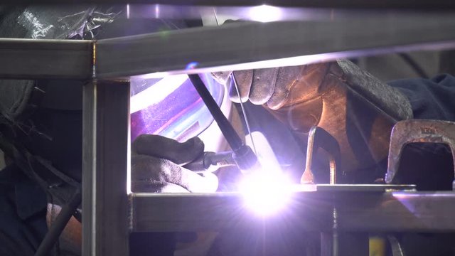 Smooth slider shot of industrial metal welding