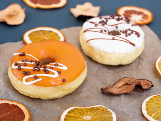 Colorful donuts on the table. close up view. copy space