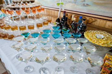 Dessert table of cocktails beverages on wedding reception.