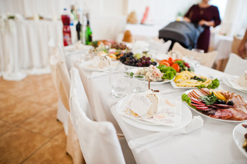 Dessert table of delicious food on wedding reception.