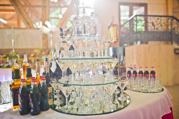 Dessert table of cocktails beverages on wedding reception.