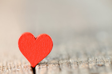 A red heart with a blurred background. High resolution photo.