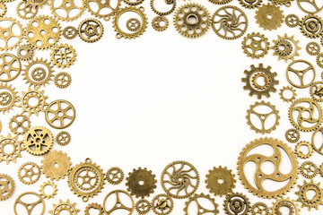 metallic gears background / Closeup of metal cog gears / close up texture pattern steampunk style and old mechanical peaces / decorative frame