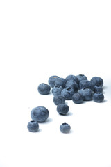 a pile of blueberry isolated on white background. Image contains copy space