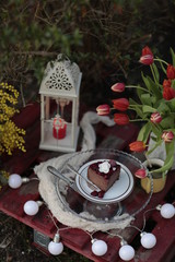christmas still life with candle and decorations