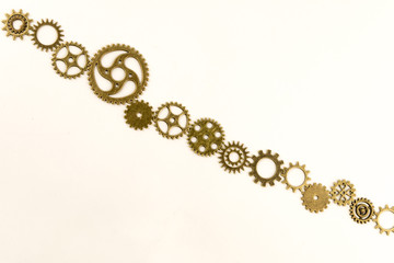 metallic gears background / Closeup of metal cog gears / close up texture pattern steampunk style and old mechanical peaces / decorative frame