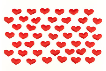 Valentines Day Heart Made of Red little cloth material hearts Isolated on White Background. Big Red Love Heart / seamless close up gift card / wedding