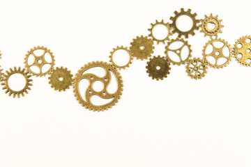 metallic gears background / Closeup of metal cog gears / close up texture pattern steampunk style and old mechanical peaces / decorative frame