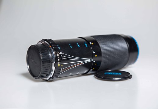 Manchester, England, 12/11/19 Carl Zeiss Jena Zoom 70 300mm lens box vintage retro camera lens with leather carry case and paperwork. Shot in a studio with white background isolated professional image - Powered by Adobe