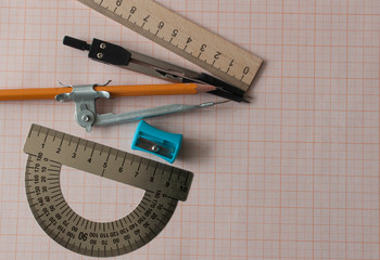 Geometry set with compass,pencil,ruler on graph paper