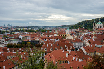 Fototapeta na wymiar Amazing view on tiled roofs in Prague from the top
