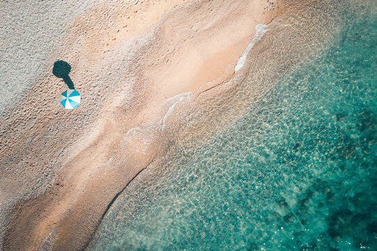 Aerial View Of Umbrella On Beach