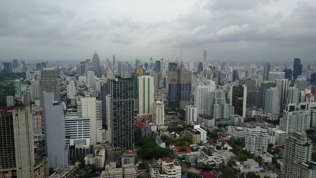 The Beautiful and Peaceful Scenery In Bangkok, Thailand With Glorious Trees and Unique Buildings - Aerial Shot