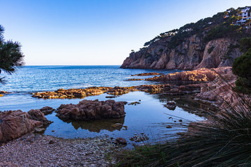 View of the cliffs and islets of the coast of Aigua-Xelida, Tamariu, Costa Brava, Catalonia, Spain