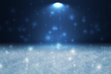 Winter abstract, blurred background with bokeh. Blurry night city lights in reflection on a snowy road. Neon light, falling snow, snowflakes.